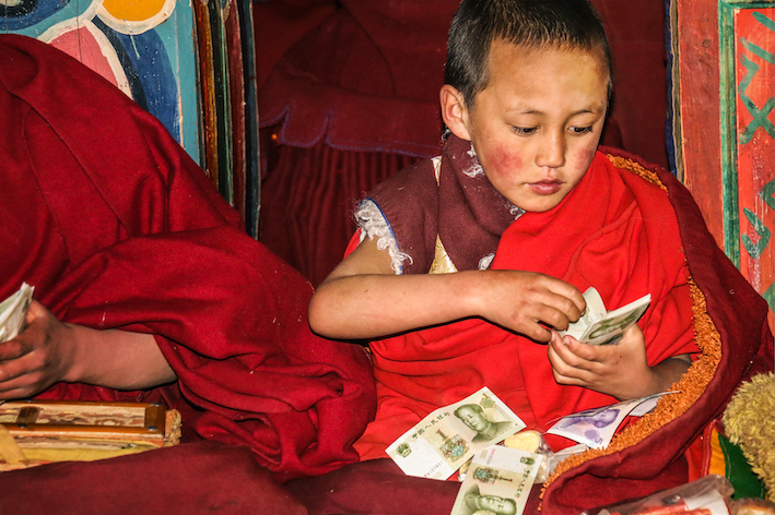 6.- Young Monk with Chinese Money